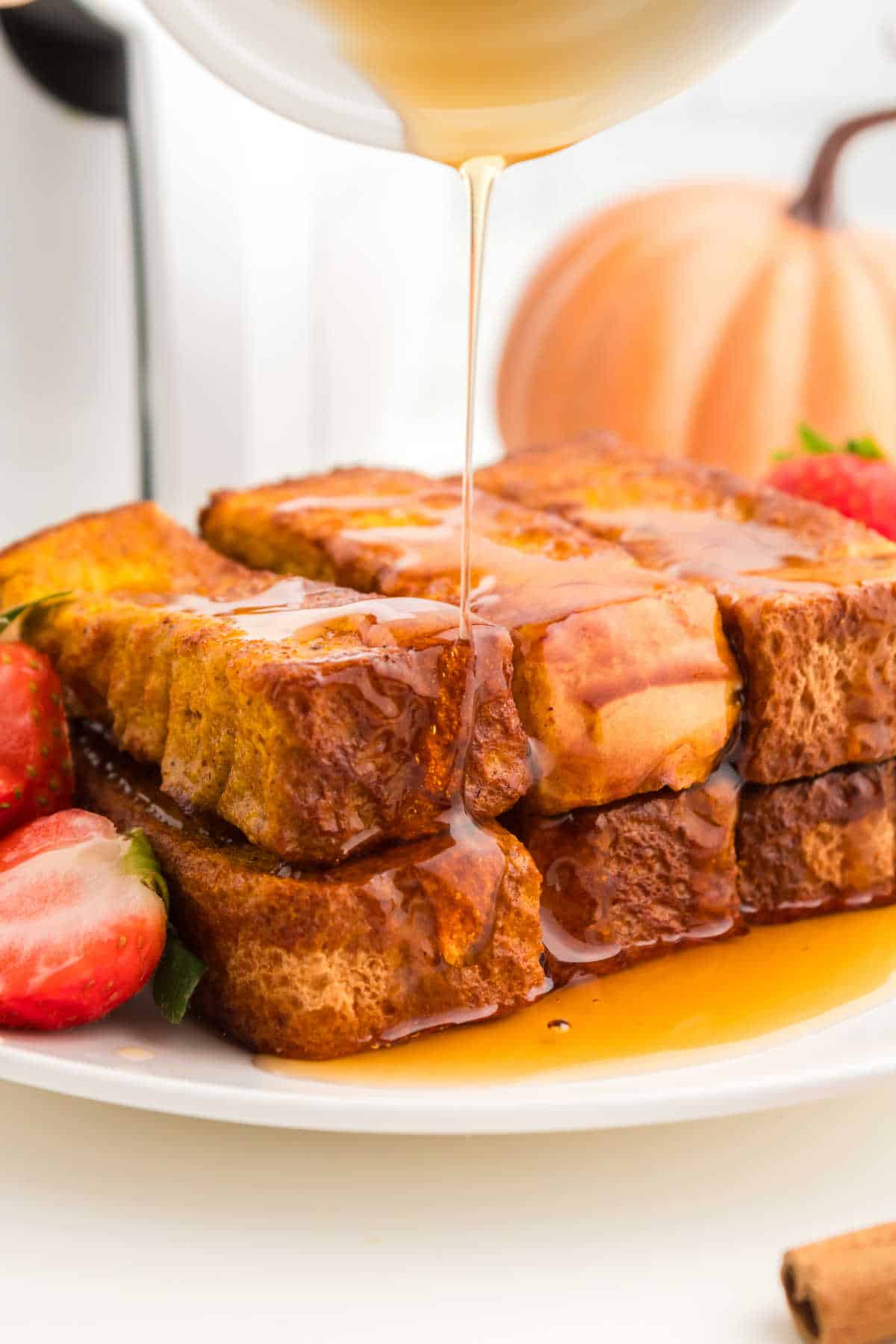 Air Fryer Pumpkin French Toast Sticks beautifully presented from an overhead angle